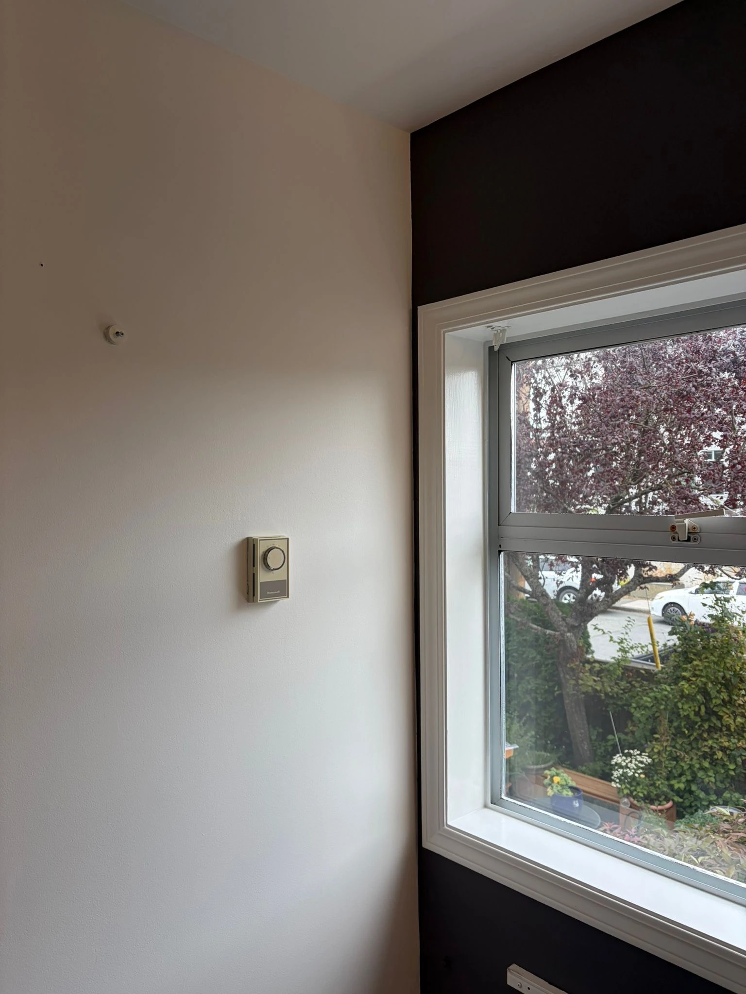 Freshly repainted washroom with clean finished walls and trim