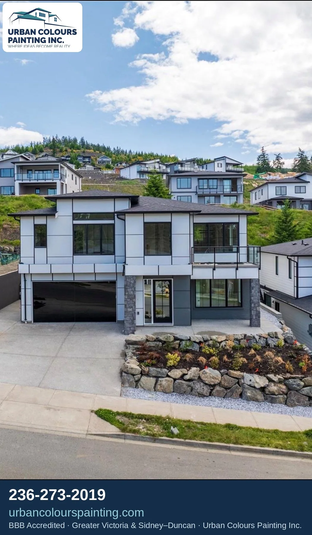 Finished multi-level home exterior on a Vancouver Island hillside